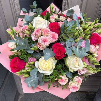 A bouquet of roses, spray roses and eustoma