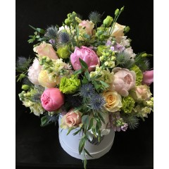 Flower composition with peonies and thisle